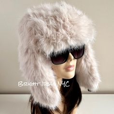 Fun, stylish and warm Cream Faux Fur Trapper Hat that makes the perfect accessory. Snap Clasp closure  Super comfy To view the rest of our collection, please visit: brightideasnyc.com Winter Hat Women, Fur Trapper, Fur Trapper Hat, Trapper Hat, Women Hat, Trapper Hats, Hat Women, Cozy Winter, Winter Hat