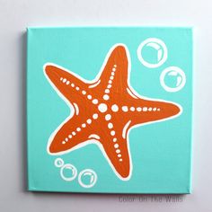 an orange starfish with bubbles and bubbles on it's face is painted on a turquoise background