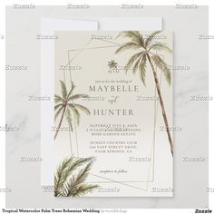 the tropical palm tree wedding card is shown on a marble background with white and gold foil