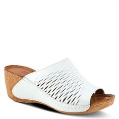 Spring Step Style: CUNACENA Mediterranean influenced, high quality premium leather slide sandal featuring a beautiful die-cut stretch-lattice design for increased breathability and flexibility, and dainty tonal stitchwork all on a strong stitched to sole construction, sculpted, comfort wedge with a flexible forefoot and a platform. Heel Height (approximately): 2 1/2" Platform Height (approximately): 3/4" Features: - Leather Upper. - Leather Lining. - Leather Insole. - PU Outsole. - Slip-on Closu White Wedge Sandals With Arch Support, White Slip-on Sandals For Spring, Elegant White Slip-on Sandals, Comfortable White Wedge Sandals With Arch Support, White Slides With Woven Sole For Spring, White Leather Wedge Sandals With Arch Support, Spring White Slides With Woven Sole, White Sandals With Arch Support For Spring, Open Toe Sandals With Perforations