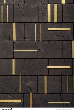 an image of a wall made out of wood with gold lines on the side and sides