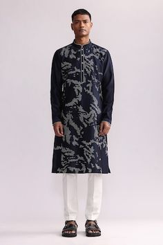 Navy chanderi kurta with thread placement hand embroidery. Comes with pant. - Aza Fashions Designer Embroidered Indigo Kurta, Embroidered Cotton Bandhgala In Blue, Embroidered Blue Cotton Bandhgala, Indigo Kurta With Floral Embroidery For Eid, Indigo Floral Embroidered Kurta For Eid, Blue Churidar With Floral Embroidery And Long Sleeves, Blue Long Sleeve Churidar With Floral Embroidery, Blue Cotton Unstitched Suit With Intricate Embroidery, Festive Indigo Kurta With Printed Motifs