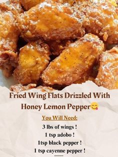 fried wings with honey lemon pepper recipe on white paper in front of the caption