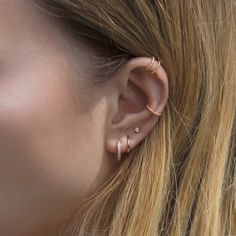 Textured Rose Gold Conch Ear Cuff that will hug your cartilage perfectly. Perfect to wear alone or paired with other huggie earrings. Sold as a single earring. Rose Gold Vermeil Hypoallergenic, lead and nickel free Thickness 1.5mm Inside Diameter 9mm Outer Diameter 12mm #E521-RG Trendy Huggie Ear Cuff For Pierced Ears, Trendy Huggie Ear Cuff Single Earring, Dainty Internally Threaded Huggie Earrings, Delicate Adjustable Single Cartilage Earring, Delicate Single Cartilage Earring, Minimalist Rose Gold Huggie Cartilage Earrings, Trendy Rose Gold Cartilage Earrings, Minimalist Rose Gold Huggie Earrings, Trendy Huggie Ear Cuff As A Gift