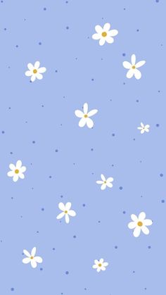 a blue background with white flowers and polka dots