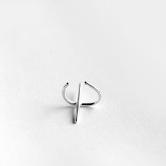 Handmade solid sterling silver ear cuff. Each earring consists of a cuff with a perpendicular bar. Dimensions: 20x12mm Width: 1mm Sold: Individually or as a pair * Suitable for non-pierced ears. Visit my shop: http://www.etsy.com/shop/jewelrymirta © MIRTA Minimalist Ear Cuff, Bar Dimensions, Earring Minimalist, Silver Ear Climbers, Cuff Earring, Ear Climbers Earrings, Silver Cleaner, Silver Choker Necklace, Wrap Earrings