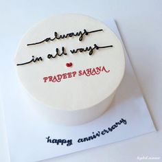 a white cake with writing on it that says happy anniversary in all ways