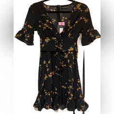 Nwt! Pretty Little Thing Black Floral Corset Swing Dress, Size 2 New!! With Tags!!! Floral Corset Mini Dress, Size 2 Add Some Florals To Your New Season Wardrobe With This Must-Have Swing Dress, It's Sure To Be Your New Go-To. Featuring A Black Material With A Contrasting Floral Print, Short Sleeves And A Flattering Fit, It's The Perfect Pick For Any Occasion. Style This Corset Dress With Some Strappy Heels For The Ultimate Weekend Combo Or Keep It Summery And Team This Floral Dress With Sandals Yellow Short Sleeve Dress For Date Night, Yellow Mini Dress With Short Sleeves For Date Night, Yellow Short Sleeve Mini Dress For Date Night, Yellow Floral Mini Dress For Date Night, Yellow Floral Print Dress For Date Night, Bodycon Shirt, Pleated Skater Dress, Lace Up Bodycon Dress, Blue Chiffon Dresses