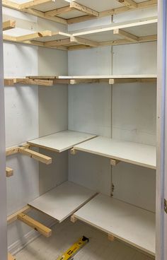 the shelves are empty and ready to be put in place for painting or remodeling