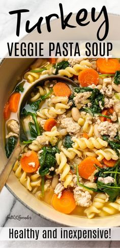 a white bowl filled with pasta and vegetables