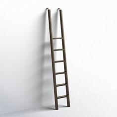 a ladder leaning up against a white wall