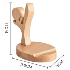 the wooden toy is shaped like an elephant