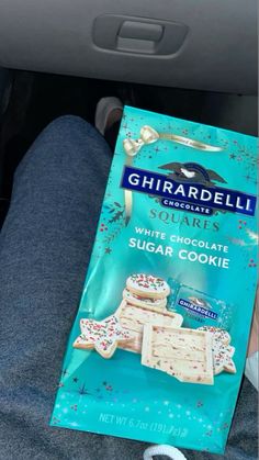 there is a bag of sugar cookies in the back seat of a car