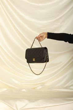 CONDITION: VERY GOOD VINTAGE , dust bag, and box.?ÿ Crafted from the finest lambskin leather, this medium Diana bag features a sleek and streamlined design with a stunning 24K gold plated chain and hardware. The black color is versatile and perfect for any occasion, while the signature Chanel diamond quilted pattern adds a touch of luxury and elegance. The spacious interior of this bag features multiple compartments, including a zip pocket, allowing you to keep all of your essentials organized and easily accessible. The adjustable chain strap can be as a single or double strap, giving you the flexibility to wear it as a shoulder bag or crossbody. Named after one of the most iconic woman in history, this bag truly carries on the history and elegance of Princess Diana. Crafted in 1994-1996 S Woman In History, Chanel 1994, Girl Backpacks School, Quilted Pattern, Streamlined Design, Backpack Tote Bag, Dior Shoes, Louis Vuitton Shoes, Iconic Women