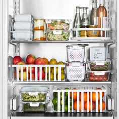 an open refrigerator filled with lots of different types of vegetables and fruit in containers on the shelves