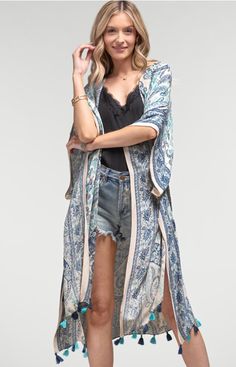 The Perfect Kimono for Warm Weather! Intricate broadened paisley print and mini tassel accent kimono *100% Viscose *APPROX. L 39.5" W 82.5" Available Online & In-Store From the #1 Boutique in Oceanside Lounge Wear Dress, Paisley Kimono, Roller Skates, Dress Romper, Paisley Print, Warm Weather, Tassels, Paisley, Lounge Wear