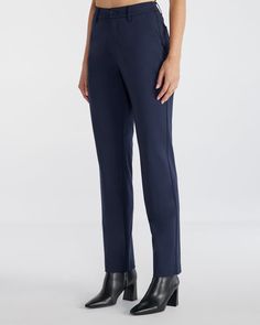 The Women's Everyday Straight-Leg Pant lives up to its name, offering comfort and versatility for daily wear. With 4-way stretch, a sleek hand feel, and a straight-leg fit that sits at your natural waist, these pants can be dressed up for a big event or kept casual for weekend errands. Comfort Stretch Dress Pants For Workwear, Relaxed Fit Straight Pants For Business Casual, Stretch Dress Pants For Work With Straight Hem, Versatile 4-way Stretch Dress Pants For Business Casual, Stretch Straight Hem Office Pants, Classic Comfort Stretch Pants For Business Casual, Comfort Stretch Straight Dress Pants For Work, Versatile Tapered Leg Dress Pants With 4-way Stretch, Versatile 4-way Stretch Tapered Leg Dress Pants