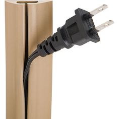 an electrical cord is plugged into the side of a cardboard box