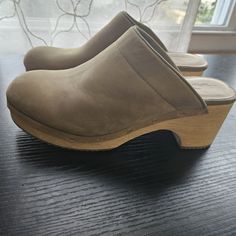 Loft Shoes Size 6 1/2. Soft Leather Clogs With Wooden Heels. Neutral Taupe Color. Never Worn But Have A Mark On Upper Portion As Pictured. Casual Suede Clogs With Wooden Heel, Casual Clogs With Stacked Open Heel, Casual Suede Clogs With Block Heel, Comfortable Clogs With Stacked Heel And Round Toe, Casual Suede Clogs With Reinforced Heel, Medium Width Slip-on Clogs With Reinforced Heel, Suede Clogs With Wooden Heel And Round Toe, Platform Slip-on Clogs Medium Width, Casual Clogs With Stacked Wedge Heel