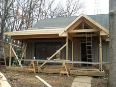 a house being built in the woods