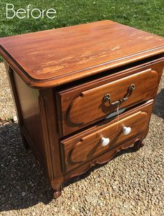 an old wooden desk with two drawers on it and the words before painted in white