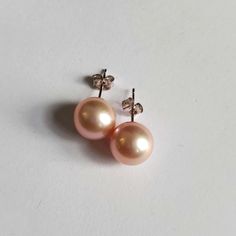 Metal: 14k Gold. Style: Earrings. Measurements: See Pictures. For: Men And Women. Description: Introducing The *Blushing Elegance* 14k Gold Pink South Sea Pearl Earrings, A True Embodiment Of Luxury And Sophistication. These Exquisite Earrings Feature Lustrous, Round South Sea Pearls With A Delicate Blush Pink Hue That Shimmers With An Inner Glow. Renowned For Their Rarity And Exceptional Beauty, South Sea Pearls Are Some Of The Most Sought-After Pearls In The World, And These Pink Variations Offer An Extra Touch Of Romantic Charm And Femininity. Set On 14k Gold Posts, These Earrings Provide The Perfect Blend Of Warmth And Elegance, Enhancing The Soft, Iridescent Luster Of The Pearls. The G South Sea Pearls Earrings, Inner Glow, Sea Pearl, South Seas, Sea Pearls, South Sea Pearls, Style Earrings, Rarity, Gold Style