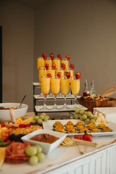 a buffet table filled with lots of food and drinks