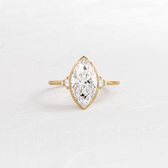 |14k Yellow Gold Bezel Marquise Engagement Ring, Dream Engagement Rings Unique, Top Engagement Rings, Marquise Cut Engagement Ring, Bezel Set Engagement Ring, Melanie Casey, Ring Marquise, Engagement Rings Marquise, Sparkly Things