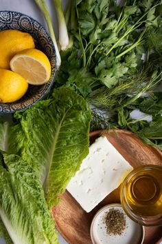 The ingredients for Maroulosalata (Greek Lettuce Salad with Feta and Dill) sit on a table. There is romaine, lemons, feta, olive oil, oregano, scallions, parsley, dill and mint. Greek Lettuce Salad, Salad With Feta Cheese, Vegetarian Salad, Creamy Feta, Oil Dressing, Feta Cheese Salad, Salad With Feta, Lemon Olive Oil