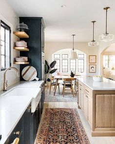 the kitchen is clean and ready to be used as a dining room or family room