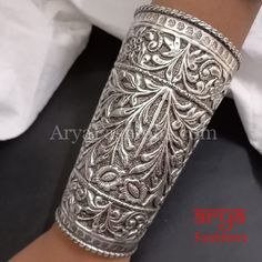 Vintage Silver Oxidized Statement Handcarved Long Cuff Bracelet 2.6,2.8 - Silver Oxidized Cuff Tribal Bracelet- Very Elegant and stylish, this bracelet can be paired with any Attire depending upon the occasion and the theme.- The base is pure brass (90%) and pure 92.5 silver (10%) which makes this very sturdy and of good quality.- 100% guarantee on the polish- it will not lose its finish/color/shine.- Very lightweight and Hand carved. - Length: 5.5"- Free size. Fits well for bangle size 2.6 and Luxury Oxidized Finish Adjustable Cuff Bracelet, Luxury Oxidized Finish Cuff Bracelet For Women, Luxury Oxidized Finish Cuff Bracelet As Gift, Luxury Women's Cuff Bracelet With Oxidized Finish, Luxury Artisan Cuff Bracelet With Oxidized Finish, Luxury Elegant Oxidized Finish Cuff Bracelet, Luxury Antique Silver Jewelry With Oxidized Finish, Luxury Oxidized Finish Bracelets, Luxury Traditional Oxidized Bangle