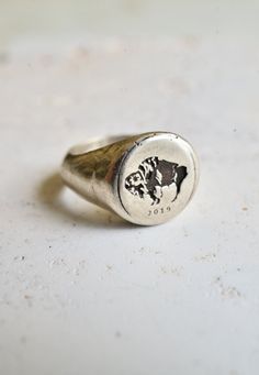 Handcrafted and cast sterling silver ring finished with an etched bison. Metal: Sterling silver, bronze and 14k gold. Minimalist Oxidized Finish Signet Ring As A Gift, Silver Oxidized Finish Signet Ring As Gift, Antique Oxidized Finish Signet Ring For Gift, Vintage Mens Rings, Mens Rings Silver, Masculine Gifts, Silver Handmade Signet Ring Collectible, Bison Ring, Cast Rings