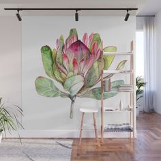 a watercolor painting of a pink flower with green leaves on the side wall mural print