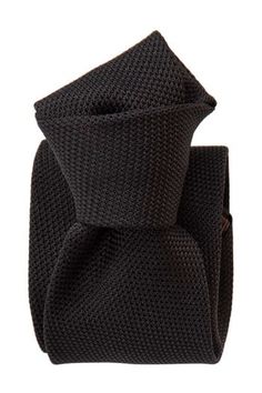 Embrace classic elegance with this black grenadine tie that will give your look understated sophistication and will make a lasting impression. Extra Long Length: Approx. 3.38" x 62.5". A classic tie width and length that is perfect for most men taller than 6'2". 100% silk grenadine garza fina: Garza fina (fine gauze) is a loose weave fabric made from high-twist yarns. It has a slightly knobby texture. Tipped with our signature pinstripe silk: Not only is it a refined finishing touch, it keeps yo Elegant Solid Color Neckwear For Black Tie Events, Elegant Solid Neckwear For Black Tie Events, Elegant Solid Neckwear For Black Tie Occasions, Classic Solid Neckwear For Black Tie Events, Elegant Black Tie For Office, Elegant Black Office Ties, Elegant Black Standard Tie And Suit Accessories, Classic Fitted Neckwear For Black-tie Events, Dapper Black Semi-formal Ties