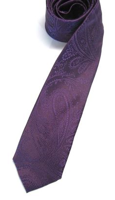 This trendy skinny tie is made of a 100% silk, all new material.It measures 58" long and 2" at the widest point. Semi-formal Standard Tie With Paisley Print, Semi-formal Paisley Print Standard Tie, Semi-formal Fitted Purple Suit And Tie Accessories, Business Suit And Tie Accessories With Paisley Print, Fitted Purple Suit And Tie Accessories For Office, Formal Paisley Print Ties, Eggplant Wedding, Wedding Colors Purple, Purple Paisley