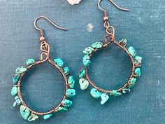 These dangly hoop earrings are made with copper wire and tiny turquoise chips. They measure 3 inches long each and come to you gift wrapped! Turquoise Wire Wrapped Hoop Earrings Gift, Turquoise Dangle Hoop Earrings Wire Wrapped, Turquoise Wire Wrapped Dangle Hoop Earrings, Turquoise Wire Wrapped Small Hoop Earrings, Wire Wrapped Turquoise, Earrings Diy Handmade, Tiger Eye Earrings, Stone Dangle Earrings, Earrings Diy