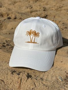 "🌴☀️ Calling all summer enthusiasts! 🌊🕶️ Feast your eyes on our Summer Vibe Hat - it's like wearing a mini tropical vacation on your head! 🏝️😎 📍About product📍 * 100% chino cotton twill * Green Camo color is 35% chino cotton twill, 65% polyester * Unstructured, 6-panel, low-profile * 6 embroidered eyelets * 3 ⅛\" (7.6 cm) crown * Adjustable strap with antique buckle 📦 Shipping & Handling Times * Domestic: Kindly allocate approximately 2-7 business days for order processing, followed by an Cheap Beach Hats With Embroidered Logo, Summer Dad Hat With Curved Brim, Embroidered Adjustable Dad Hat For Summer, Casual Hats For Summer Adventures, White Baseball Cap For Summer, Summer Snapback Dad Hat, Embroidered Summer Dad Hat, Summer Embroidered Cotton Dad Hat, Embroidered Dad Hat For Summer