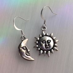 Tibetan silver sun and moon charms, on your choice of ear hooks * Fish hook * Lever back * Kidney (47mm, will fit through stretched ear tunnels) * Post-style * Clip on (non-piercing)  * Sterling Silver Fish hooks ..: V I E W   S H O P:.. www.lotusfairy.etsy.com www.shopEarthshine.com ..: P O L I C I E S :.. Please see the drop down FAQs menu All items are FINAL SALE. ★ I M P O R T A N T ★ This product is not intended to be used by, or around,  anyone under the age of 13.  ShopEarthshine.com ★ lotusfairy.etsy.com  Canadian buyers:  Prices shown include GST/HST. Adjustable Sun And Moon Sterling Silver Earrings, Adjustable Sterling Silver Earrings With Sun And Moon Design, Adjustable Sterling Silver Sun And Moon Earrings, Sterling Silver Sun And Moon Adjustable Earrings, Silver Earrings With Sun And Moon Design - Symbolic, Silver Symbolic Earrings With Sun And Moon Design, Symbolic Silver Earrings With Sun And Moon Design, Sun And Moon Design Dangle Earrings For Summer, Trendy Silver Moon-shaped Earrings