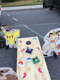 two wooden boards with pokemon pictures on them