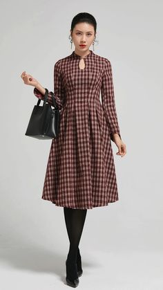 Mandarin collar plaid winter wool dress for trendsetting women. Stay cozy and stylish all season long! 

SKU 2295 
Link in bio 

#WinterFashion #PlaidDress #MandarinCollar #WoolDress #Fashionista #Xiaolizihandmade Plaid Dress For Office, Winter Wool Tweed Dress Knee-length, Plaid Long Sleeve Midi Dress For Work, Knee-length Wool Tweed Dress For Winter, Winter Wool Tweed Knee-length Dress, Fall A-line Tweed Dress, Plaid Dress For Office In Fall, Chic Plaid Tweed Dress For Fall, Chic Houndstooth Dresses For Winter