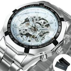 Men Skeleton Mechanical Watch
FORSINING New Luxury Men Watches
Brand: Forsining/ T-WINNER
Style: Fashion, Casual, Business, Luxury, Sport

Main Feature:
1.Luxury design watch, fashion classic style
2.Hot sale stainless steel strap watch.
3.12-months movement guarantee

2 LOGO VERSIONS AVAILABLE ( FORSINING / T-WINNER), PLEASE INFORM US IF YOU WANT A CERTAIN LOGO. IF NOT SPECIFIED, WE MAY SEND BY RANDOM:)

Specifications:
Dial diameter: 45 mm
Case thickness: 14 mm
Watch length: 240 mm
Band width: Skeleton Vintage, Gold Skeleton, Watches Logo, Mens Watch Brands, Watch Gift Box, Rock Style Clothing, Black Pants Men, Studs Men, Modern Accessories