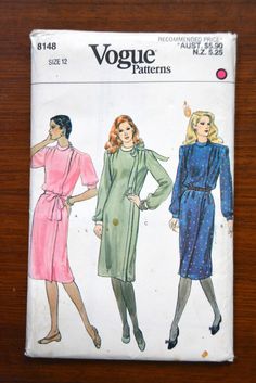 an old fashion sewing pattern for women's robes and dresses, on a wooden surface