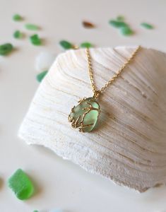 ▶ Discover the beauty of the ocean in wearable art. I take the mesmerizing allure of sea glass and transform it into stunning, one-of-a-kind necklaces. Each piece tells a story of the sea, from its journey as discarded glass to its rebirth as a unique and elegant accessory. Here's why my sea glass necklaces are a must-have addition to your jewelry collection: - Nature's Treasure: I handpicked the sea glass from Spanish shorelines, where the relentless tides have transformed glass fragments into smooth, colorful gems. These pieces are like treasures from the sea, each with its own history and character. - Timeless Elegance: This necklaces are versatile, suitable for both everyday wear and special occasions. - Handcrafted with Love: Every necklace in my shop is carefully handcrafted by me, w Personalized Ocean-inspired Jewelry Gift, Handmade Ocean-inspired Jewelry As Gift, Handmade Ocean-inspired Jewelry Gift, Sea Glass Round Necklace As Gift, Round Sea Glass Necklace As A Gift, Round Sea Glass Necklace For Gift, Ocean-inspired Wire Wrapped Jewelry As Gift, Ocean-inspired Wire Wrapped Jewelry For Gifts, Ocean-inspired Wire Wrapped Jewelry Gift