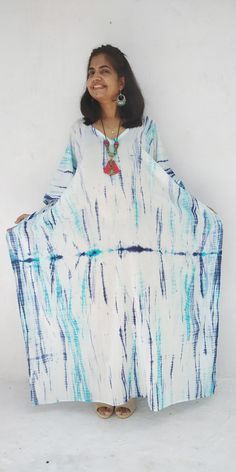 "All dresses are custommade- ONLY FOR YOU! . Indian tie- dyed kaftans robe- made to measure- all customizations happily accepted!! Long tie-dyed Kaftan, Plus size clothing, Christmas gift, Gifts for her, Beach cover up, Vacation dress, Party dress, Cocktail dress, Wedding party, Chic dress, Holiday dress , Blue dress Kaftan Tunic Maternity dress for photoshoot MESMERIZING turquoise and blue colored on white base tie-dyed RAYON CAFTAN.. and mesmerizing for the brides, party dress or beach cover u Turquoise Maxi Dress For Beach Cover-up, Turquoise Maxi Dress For Beach Season, Hippie Batik Print Dresses, Flowy Tie-dye Batik Print Dress, Long Summer Dress With Batik Print, Blue Bohemian Long Beach Dress, Tie Dye Maxi Dress For Beach Cover-up, Batik Print Maxi Dress For Beach Cover-up, Tie-dye Maxi Length Dress For Beach