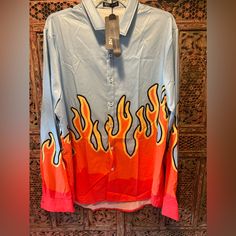 Brand New Tax Attached Romwe Flame, Long Sleeve Shirt Baby Blue Background With Orange, Red, And Yellow Flames Size Xxl Red Graphic Print Button-up Top, Trendy Blue Printed Shirt, Trendy Orange Long Sleeve Shirt, Casual Orange Blouse With Graphic Print, Orange Collared Shirt With Graphic Print, Orange Long Sleeve Tops With Graphic Print, Orange Long Sleeve Top With Graphic Print, Spring Orange Shirt With Graphic Print, Orange Graphic Print Collared Tops