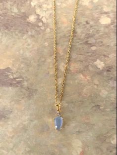 "Very dainty gold tone and ice blue stone necklace with rhinestone detail, light blue necklace, light blue jewelry, blue stone necklace, necklace blue, sky blue necklace, light blue gifts Pendant measures 1/2\" L X 1/4\" W and is on an 18\" chain.   ★ Want to see more?  Please visit my shop at: https://www.etsy.com/shop/DesignsByPeg" Dainty Blue Necklace, Light Blue And Gold Jewelry, Something Blue Necklace, Light Blue And Gold Necklace, Gold Blue Jewelry, Blue Dress Jewelry Ideas, Hoco Accessories, Blue Stone Jewellery, Sky Blue Necklace