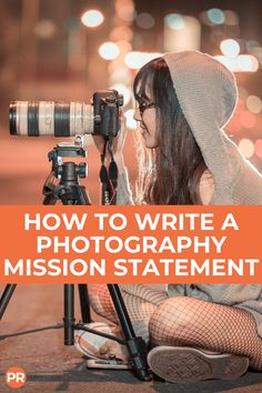 a woman is sitting on the ground with a camera and taking pictures in front of her