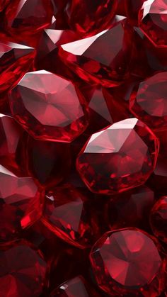 many red diamonds are scattered together on the ground