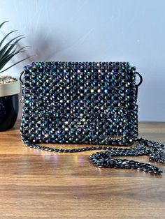 Dazzling nights call for an exquisite companion. This beaded evening bag adds the perfect touch of glamour to your ensemble. Dimension: Width: 18cm Height: 13cm Depth: 6cm The bag comes with two detachable handles. Feel free to contact me for any questions. Rectangular Sequin Bag For Evening, Embellished Handheld Clutch For Evening, Glamorous Handheld Evening Bag With Chain Strap, Luxury Beaded Elegant Evening Bag, Rectangular Sequined Evening Bag, Glamorous Evening Shoulder Bag With Sequins, Evening Clutch Mobile Phone Bag Handheld, Evening Clutch Mobile Phone Pouch, Rectangular Shoulder Bag With Sequins For Night Out