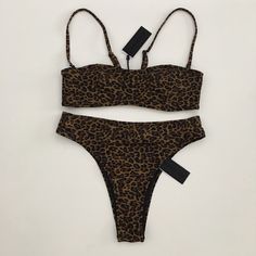 Nwt High Waisted Leopard Bikini Set Sz Xs Kendall + Kylie Brand Color Brown & Black Design Animal Print Bikini Top Size Extra Small Bikini Bottom Size Extra Small Features Removable Straps No Tan Lines & Adjustable Straps For Best Fit Perfect Summer Bikini For You! Retail $120 Leopard Print Summer Swimwear, Leopard Print Fitted Swimwear For Summer, Summer Fitted Leopard Print Swimwear, Fitted Leopard Print Swimwear For Poolside, Fitted Leopard Print Swimwear For Summer, Brown Bandeau Swimwear For Summer, Brown Bandeau Swimwear For Poolside, Fitted Leopard Print Swimwear For Beach, Fitted Leopard Print Beachwear Swimwear